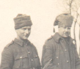 Click for full photo: Liverpool Scottish in the trenches (Spring 1915, Ypres Salient) with a variety of headdress, Sgt DAB Marples on the right