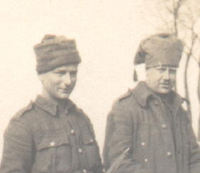 Click for full photo: Liverpool Scottish in the trenches (Spring 1915, Ypres Salient) with a variety of headdress, Sgt DAB Marples on the right