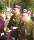 Crown Copyright. Two Liverpool Scottish soldiers, Kingsman Clarke (left) and LCpl Dimitri Mills (right), watch the unveiling of the Liverpool Scottish Memorial Stone near Ieper/Ypres in Belgium 29/07/00