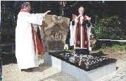 Father Boni Van Looveren (left) and Canon Nicholas Frayling dedicate the Liverpool Scottish Memorial Stone 29/07/00
